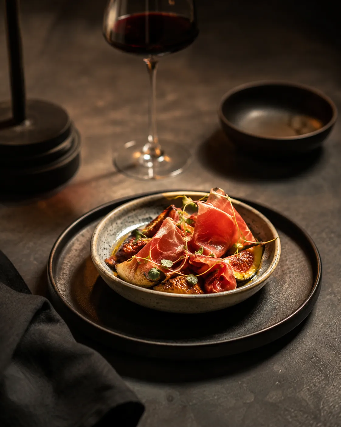 Small plate served to share on a dark table.